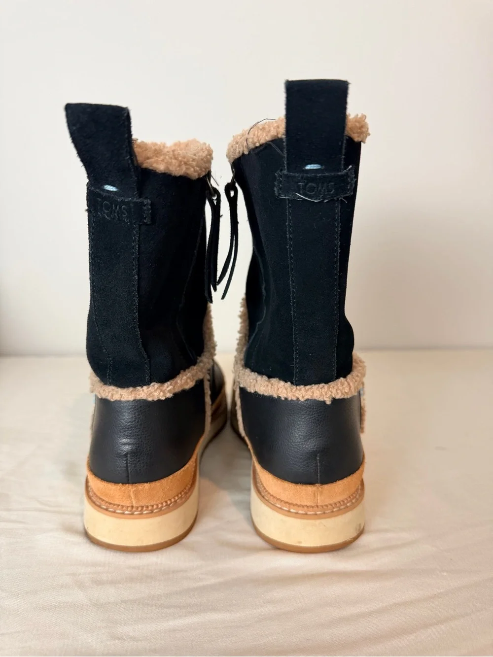 TOMS Black Shearling-Trim Winter Pull-On Boot with Tan Platform